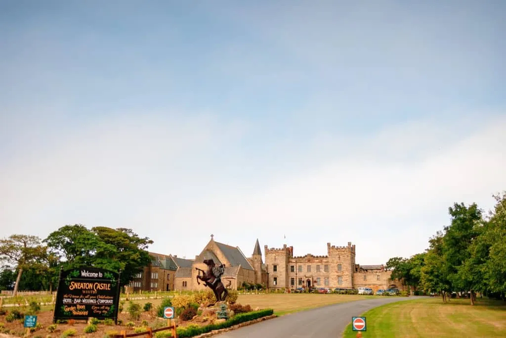 Sneaton Castle wedding - bride and groom at historic castle venue on Yorkshire coast