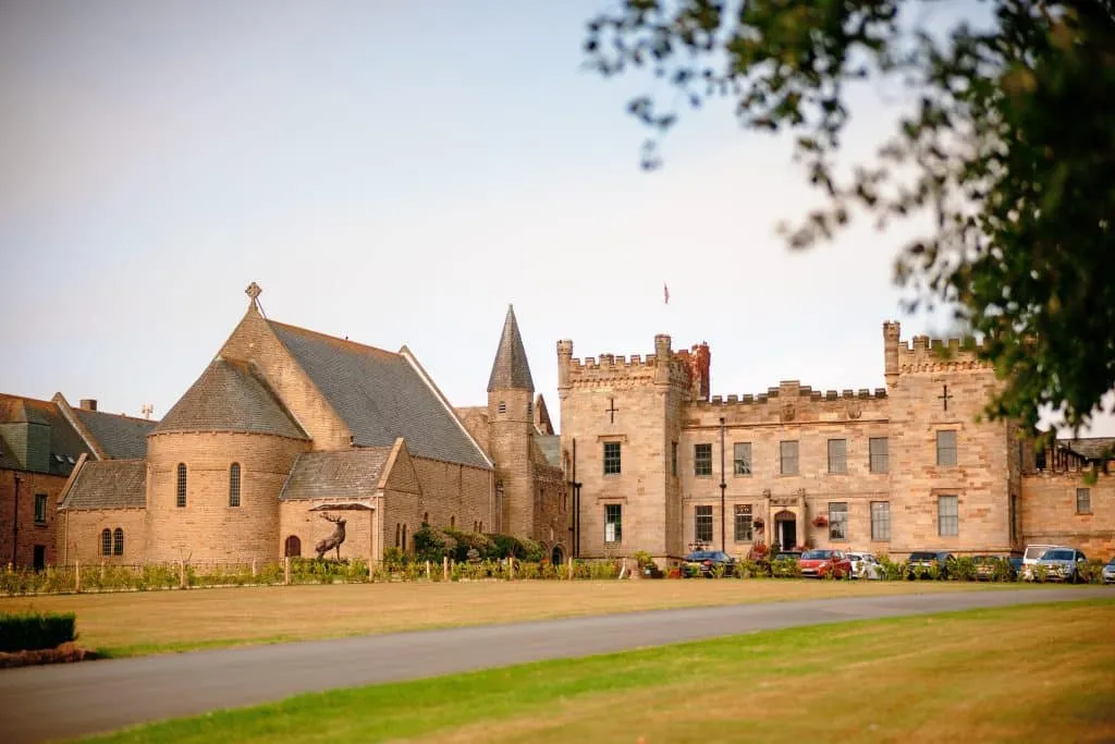 Sneaton Castle wedding - bride and groom at historic castle venue on Yorkshire coast
